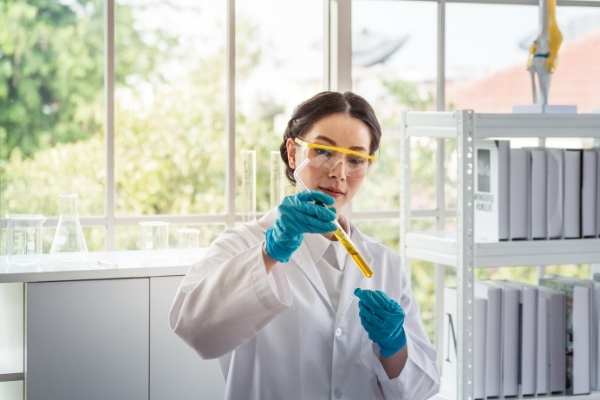 A female scientist holding a test tube