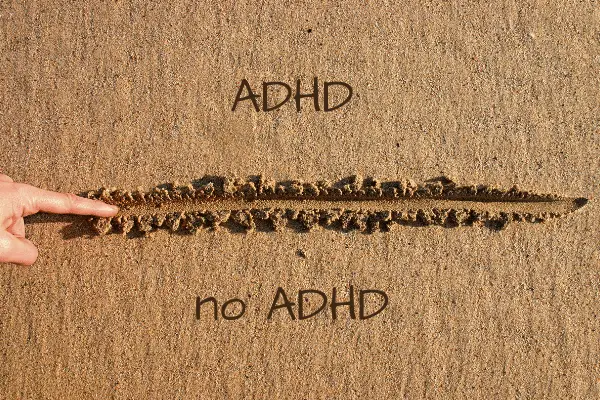 a line drawn in the sand, with ADHD on one side, and no ADHD on the other