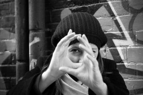 Woman using hands to focus 