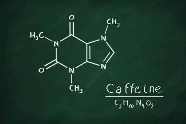 molecular structure of caffeine on a chalkboard